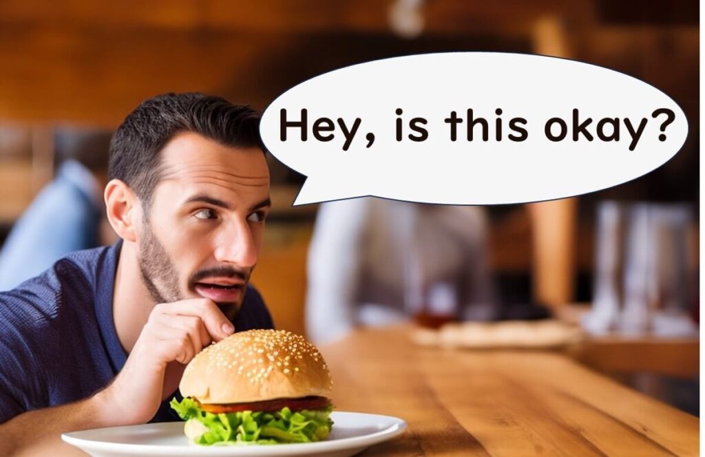 Man looking skeptically at a hamburger with the caption 'Hey, is this okay?', expressing concerns about food safety.